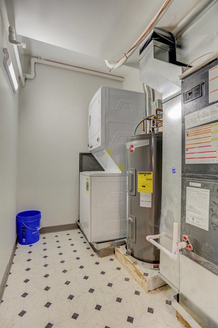 218 West Main Street Urbana, IL 61801 - Photo 8 of 96 a bathroom with a sink and a mirror