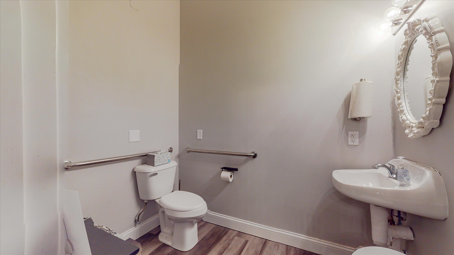 218 West Main Street Urbana, IL 61801 - Photo 88 of 96 a white toilet sitting next to a bathroom sink