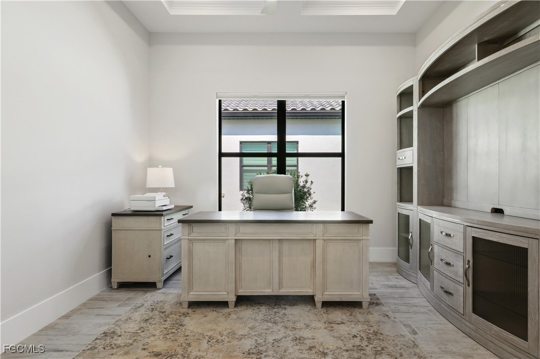18377 Ridgeline Drive Estero, FL 33928 - Photo 29 of 50 a kitchen with stainless steel appliances a sink stove and cabinets