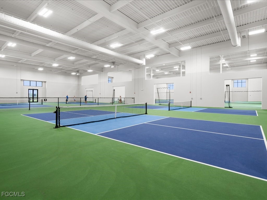 18377 Ridgeline Drive Estero, FL 33928 - Photo 47 of 50 a room with lots of green space and trampoline