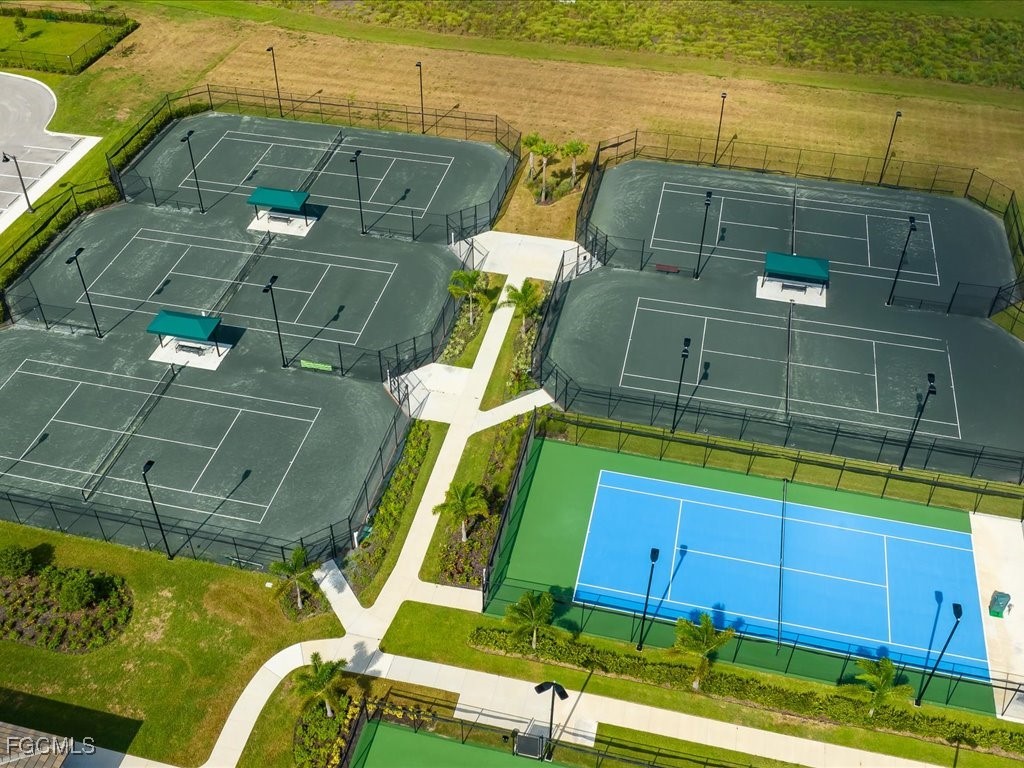 18377 Ridgeline Drive Estero, FL 33928 - Photo 50 of 50 a view of a backyard with swimming pool