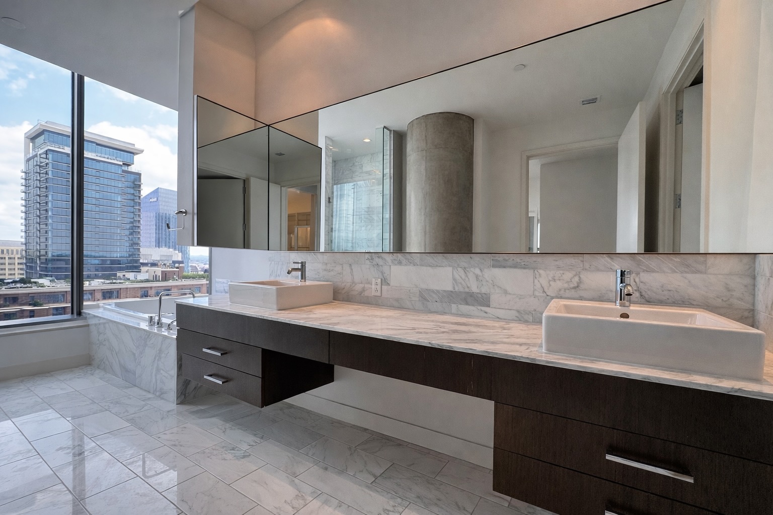 210 Lavaca Street, Unit 2808 Austin, TX 78701 - Photo 13 of 32 a bathroom with a double vanity sink a mirror and a bathtub