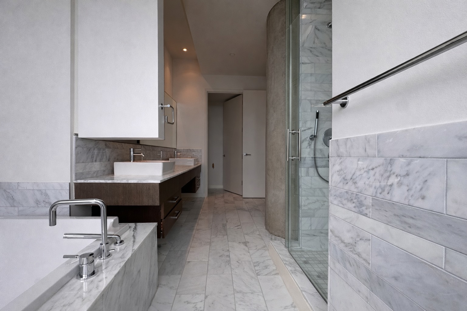 210 Lavaca Street, Unit 2808 Austin, TX 78701 - Photo 16 of 32 a bathroom with a double vanity sink a mirror and a bathtub
