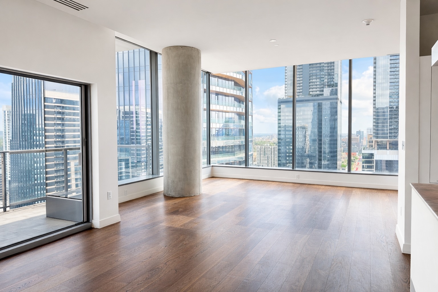210 Lavaca Street, Unit 2808 Austin, TX 78701 - Photo 2 of 32 a view of an empty room with wooden floor and a window