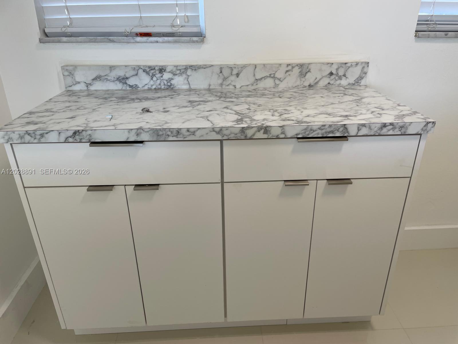 14170 Southwest 84th Street, Unit 402F Miami, FL 33183 - Photo 15 of 36 Kitchen Cabinet