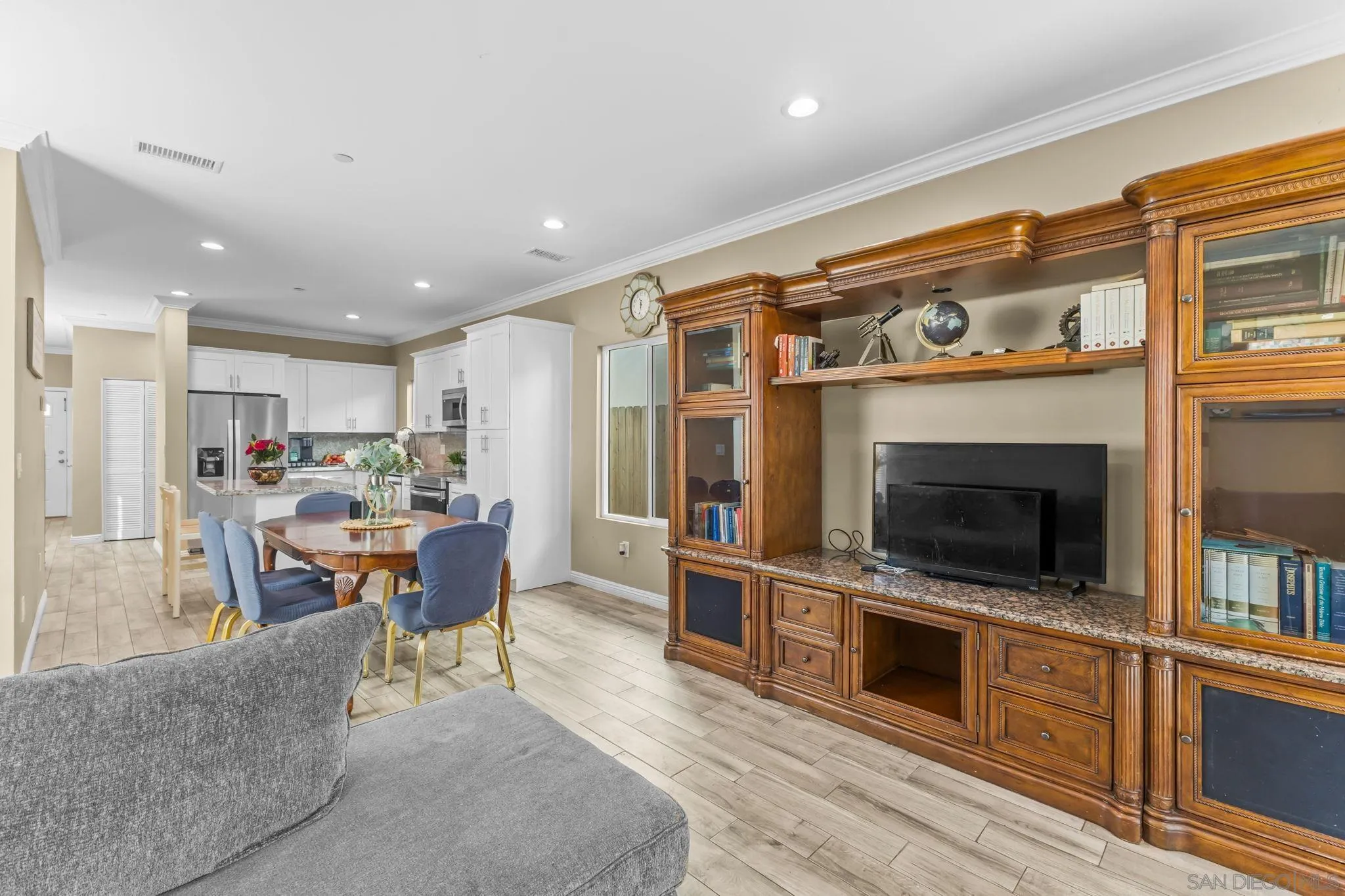 903 Concepcion Avenue Spring Valley, CA 91977 - Photo 24 of 69 a living room with stainless steel appliances kitchen island granite countertop a stove and a sink