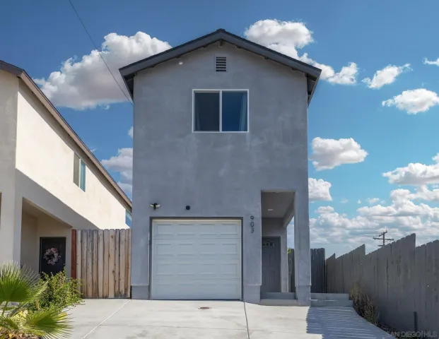 a kitchen with a sink a counter space appliances and cabinets