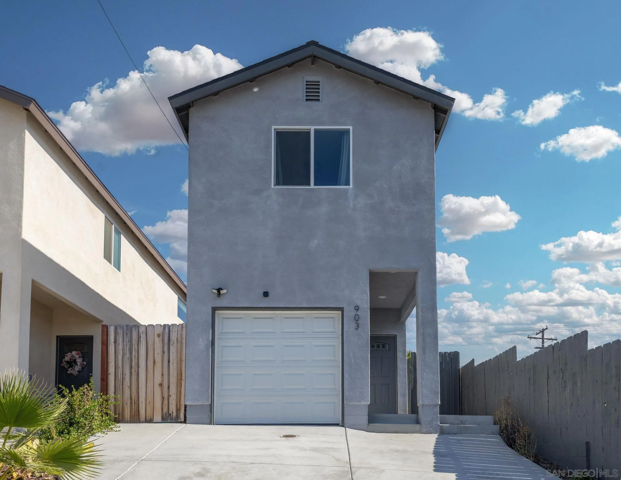 903 Concepcion Avenue Spring Valley, CA 91977 - Photo 4 of 69 a backyard of a house with table and chairs