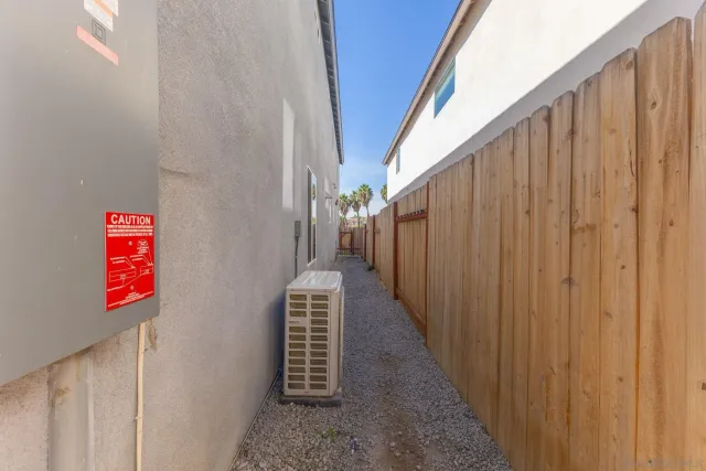 a kitchen with a refrigerator and a sink