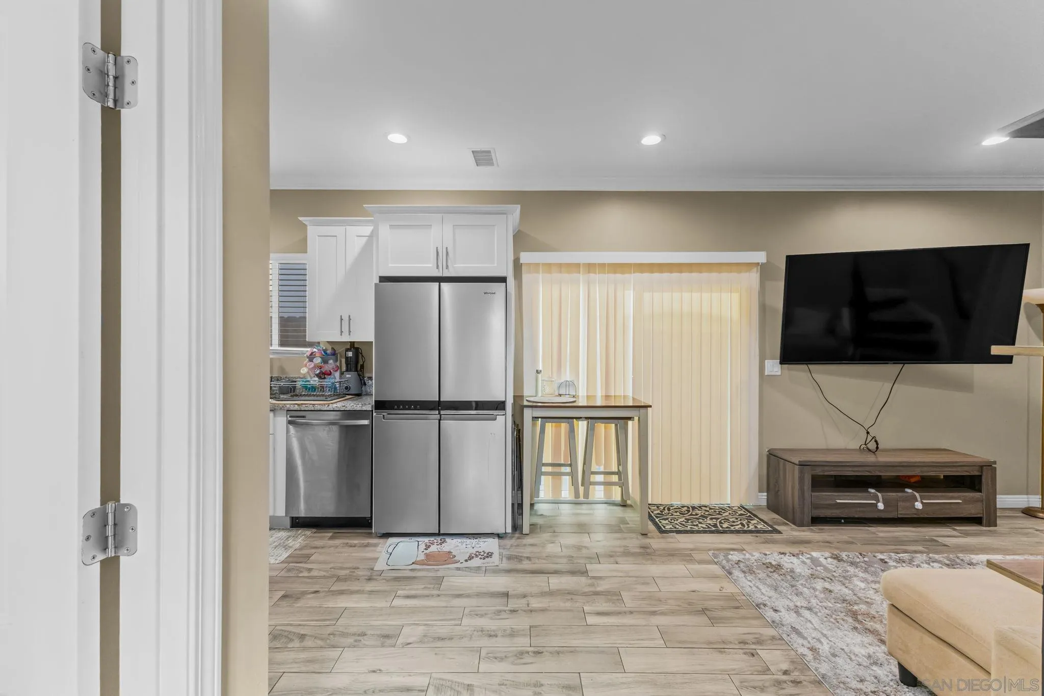 903 Concepcion Avenue Spring Valley, CA 91977 - Photo 45 of 69 a living room with furniture and a flat screen tv