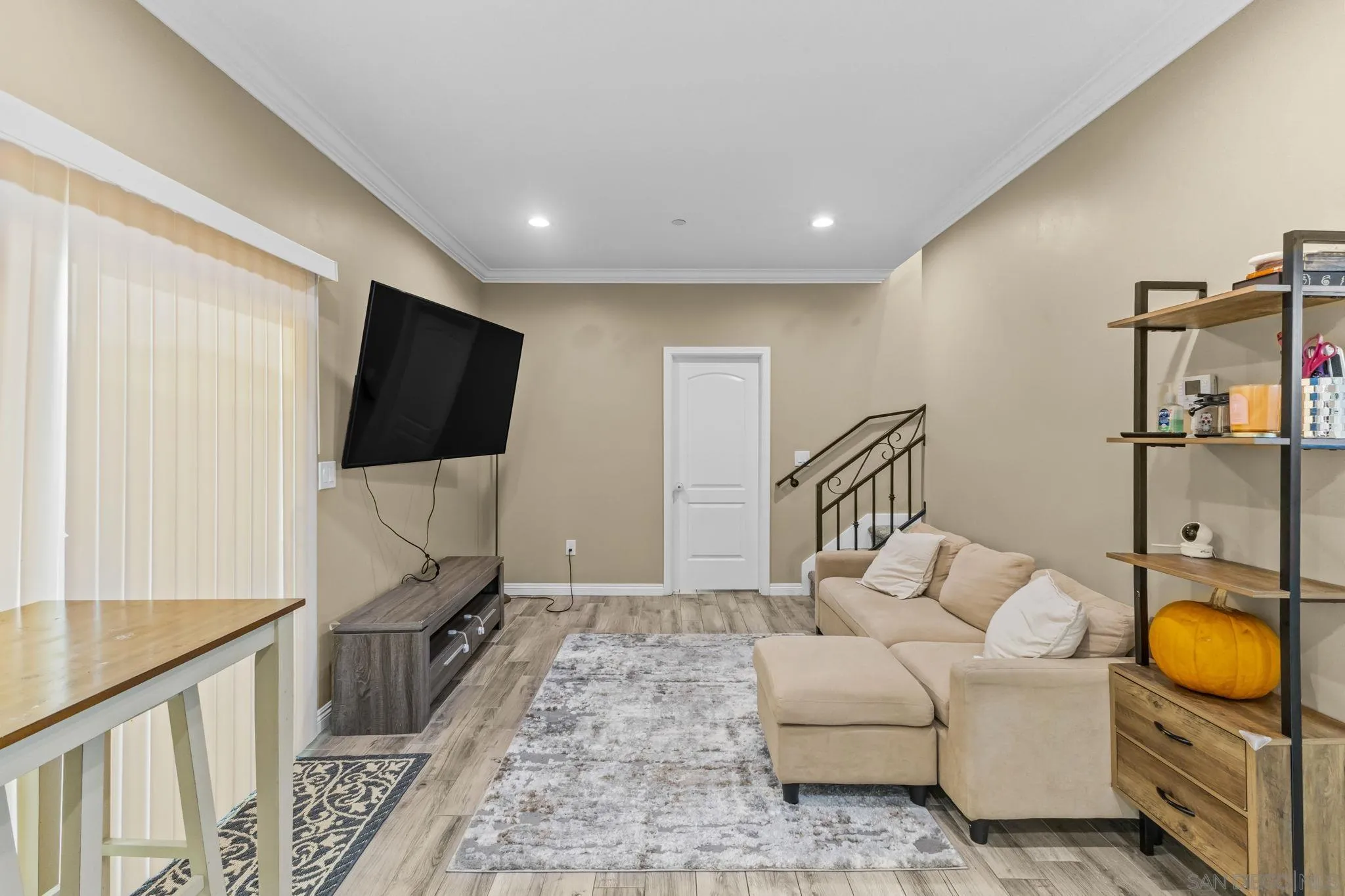 903 Concepcion Avenue Spring Valley, CA 91977 - Photo 52 of 69 a living room with furniture and a flat screen tv