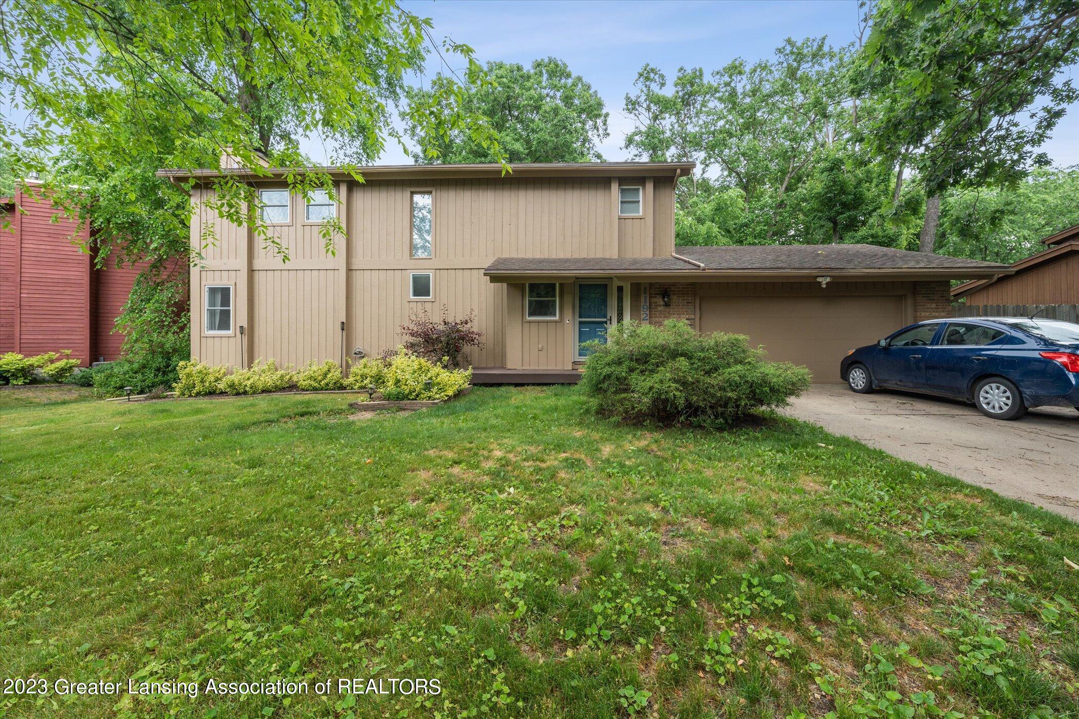 1192 Buckingham Road Haslett, MI 48840 - Photo 3 of 41 03-1192-Buckingham-Rd-Haslett-MI-48840-W