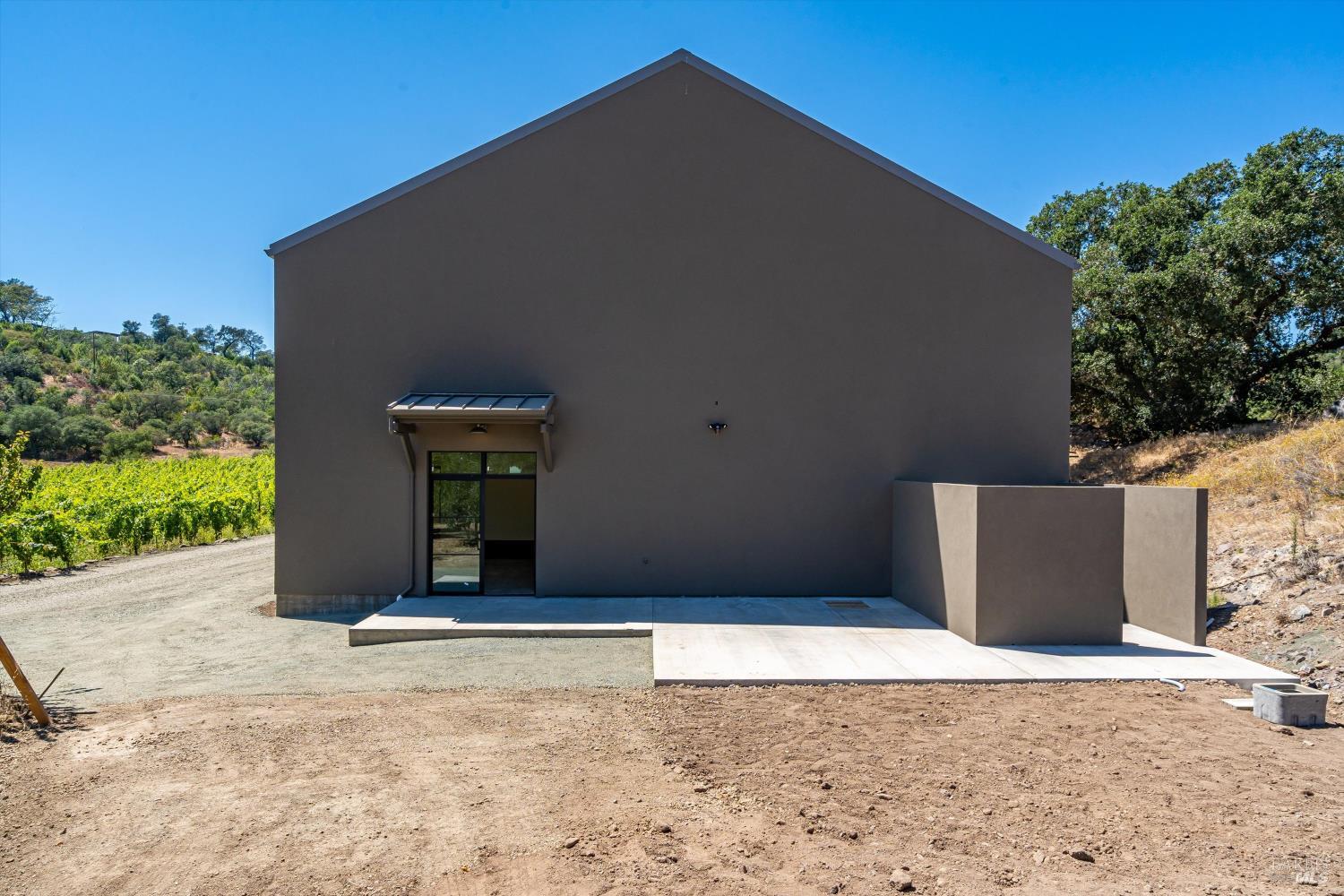 2929 Atlas Peak Road Napa, CA 94558 - Photo 49 of 56 a front view of a house with a yard