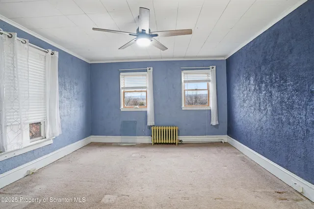 a kitchen with stainless steel appliances granite countertop a sink refrigerator and cabinets