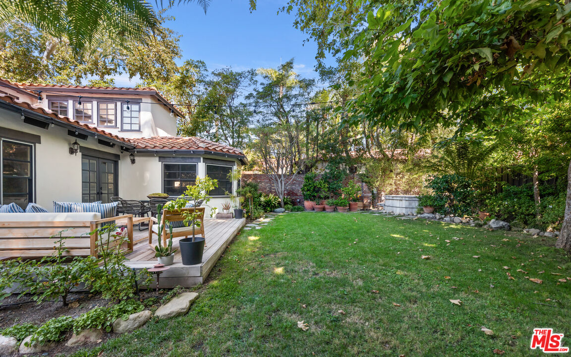558 East Channel Road Santa Monica, CA 90402 - Photo 16 of 34 a front view of house with yard and outdoor seating