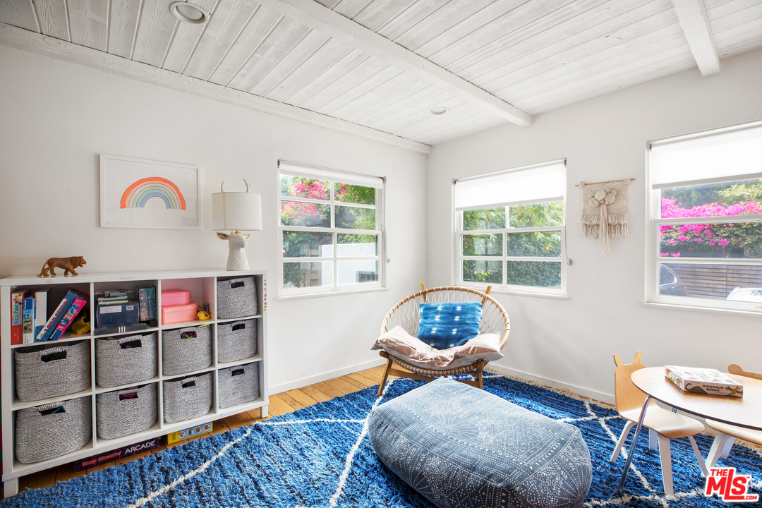 558 East Channel Road Santa Monica, CA 90402 - Photo 20 of 34 a bedroom with furniture and a window