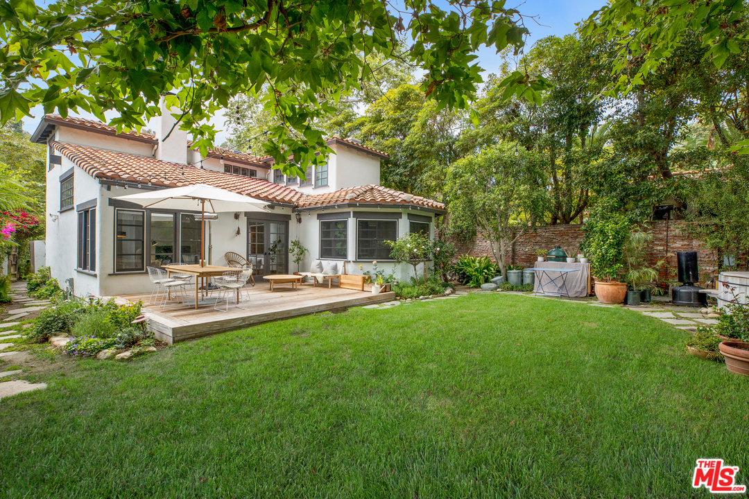 558 East Channel Road Santa Monica, CA 90402 - Photo 30 of 34 a front view of a house with yard patio and swimming pool