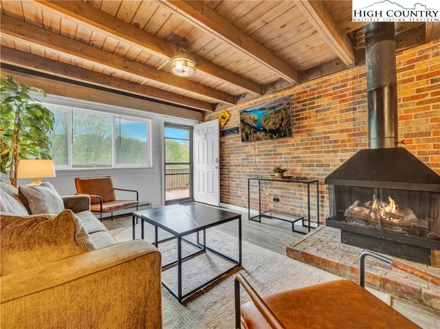 a kitchen with stainless steel appliances granite countertop a stove and cabinets