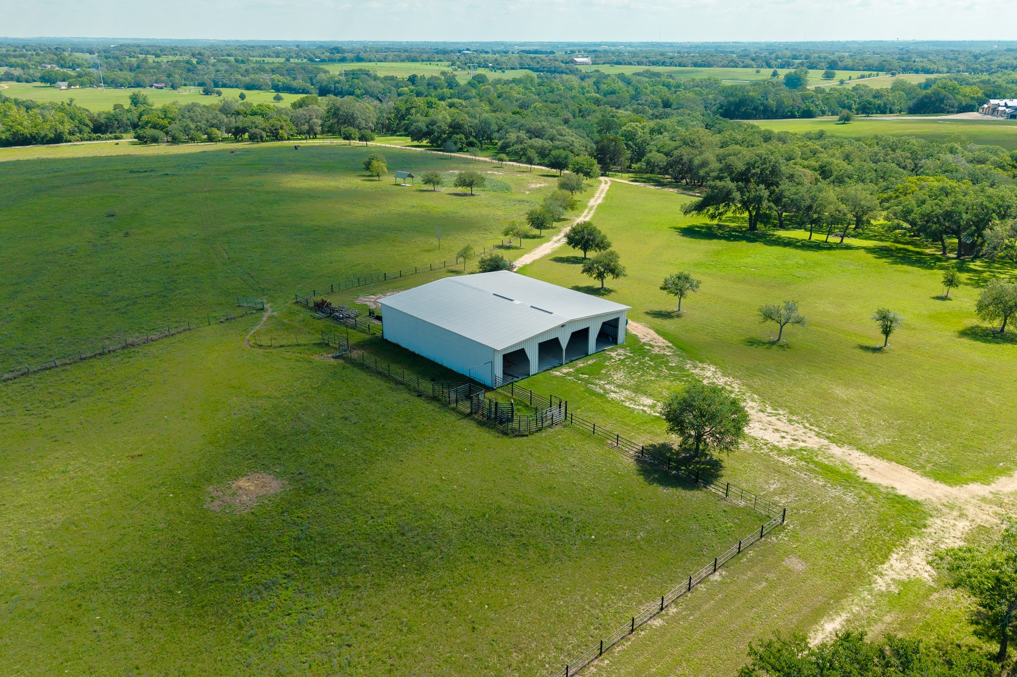 5018 Wolters Road Schulenburg, TX 78956 - Photo 10 of 39 an aerial view of a house with a yard