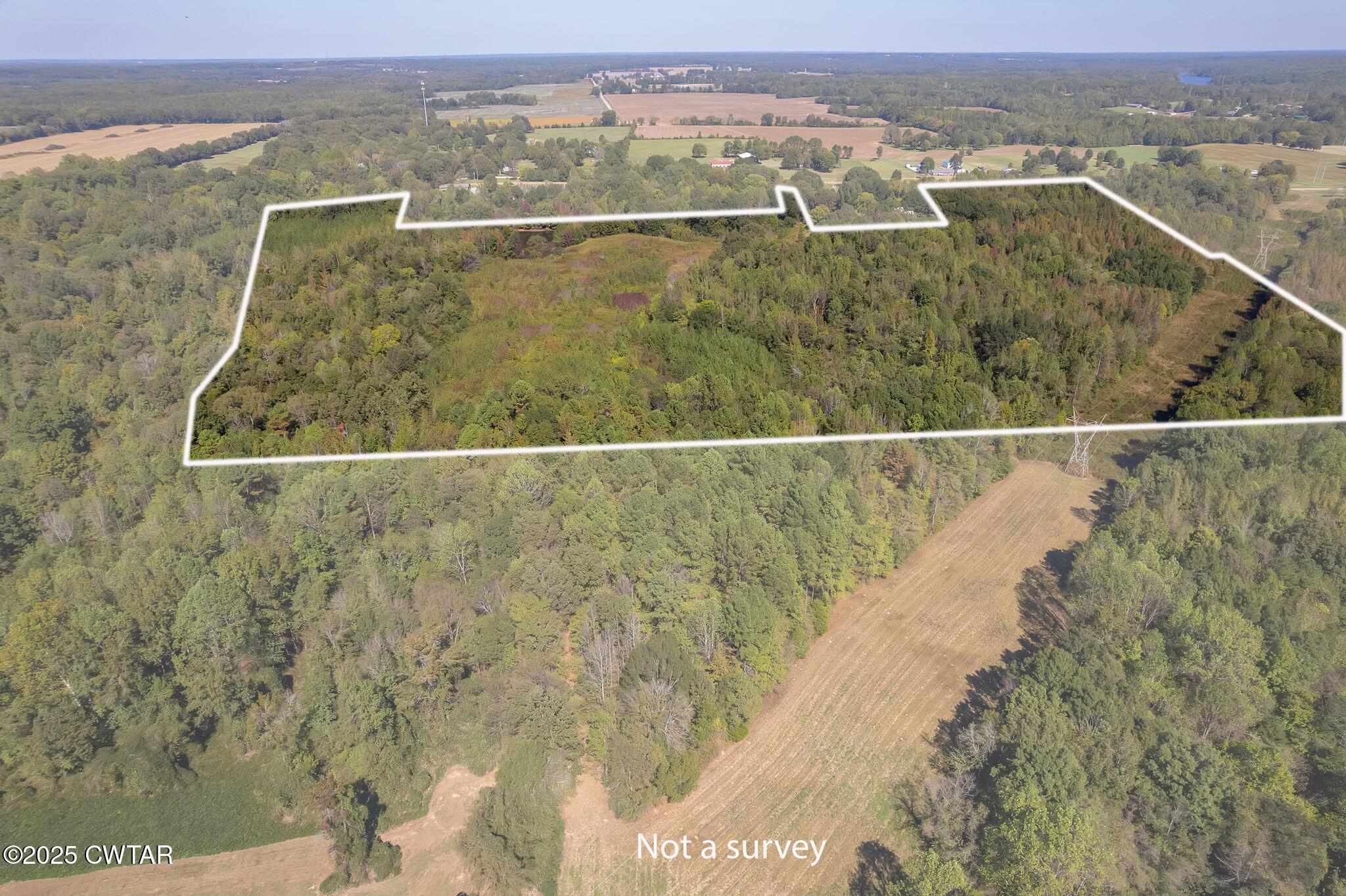 0 Beech Bluff Road Jackson, TN 38301 - Photo 2 of 15 an aerial view of residential houses with outdoor space