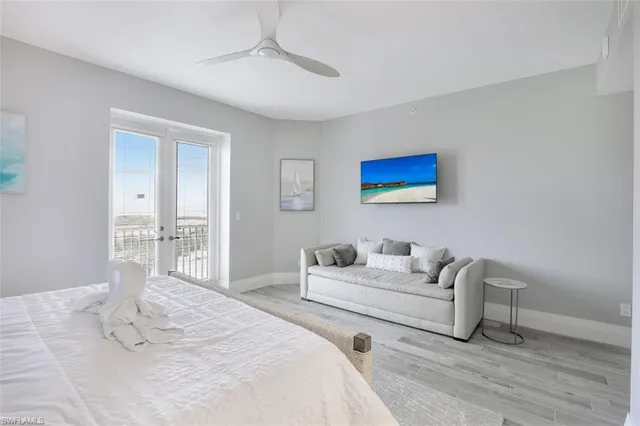 a bedroom with a bed and a couch