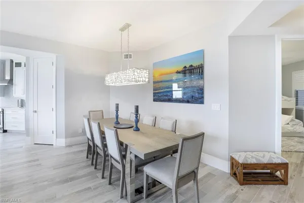 a view of a dining room with furniture