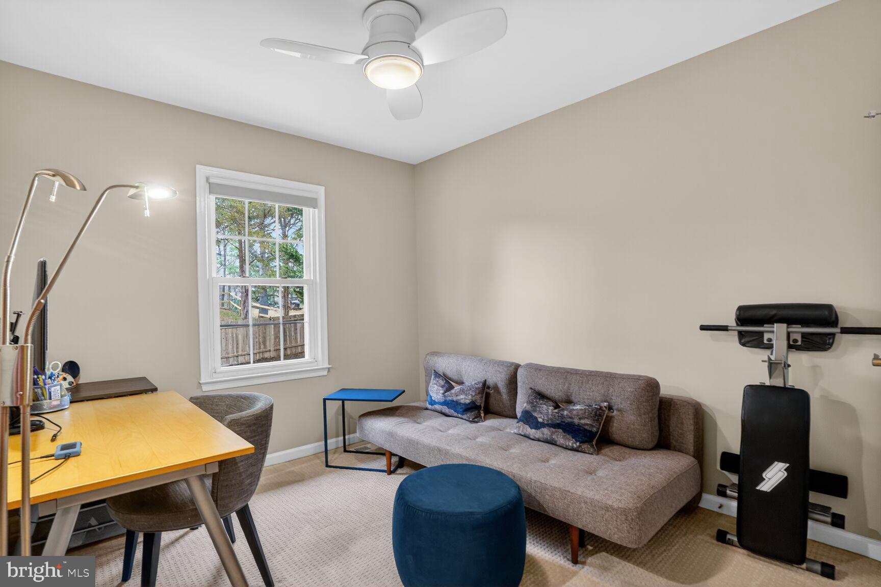 1354 Shallow Ford Road Herndon, VA 20170 - Photo 27 of 34 a living room with furniture and a window