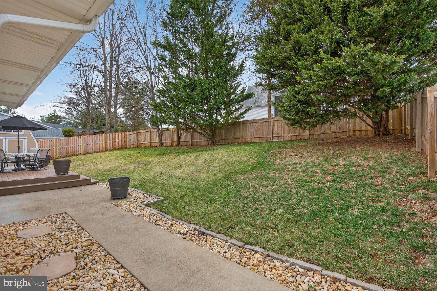 1354 Shallow Ford Road Herndon, VA 20170 - Photo 30 of 34 a view of a yard with plants and trees