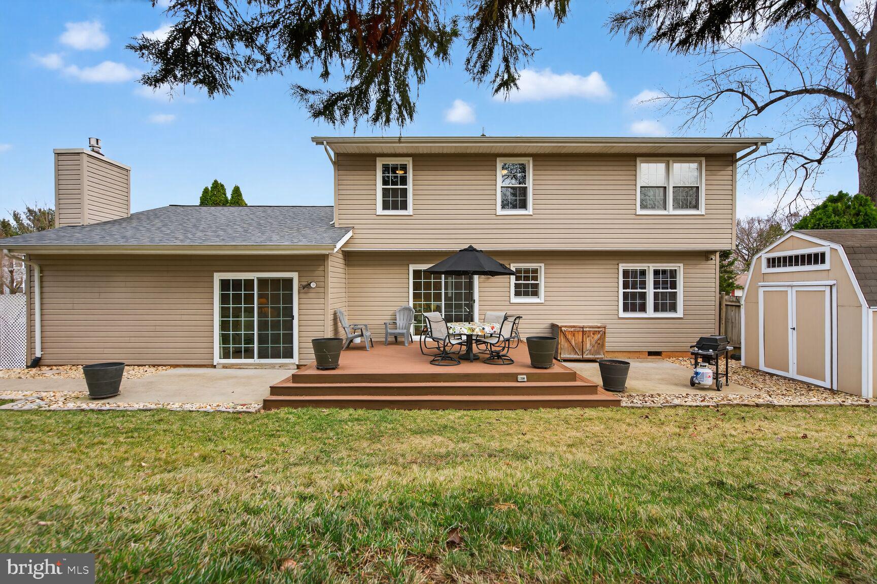 1354 Shallow Ford Road Herndon, VA 20170 - Photo 31 of 34 a front view of a house with a yard
