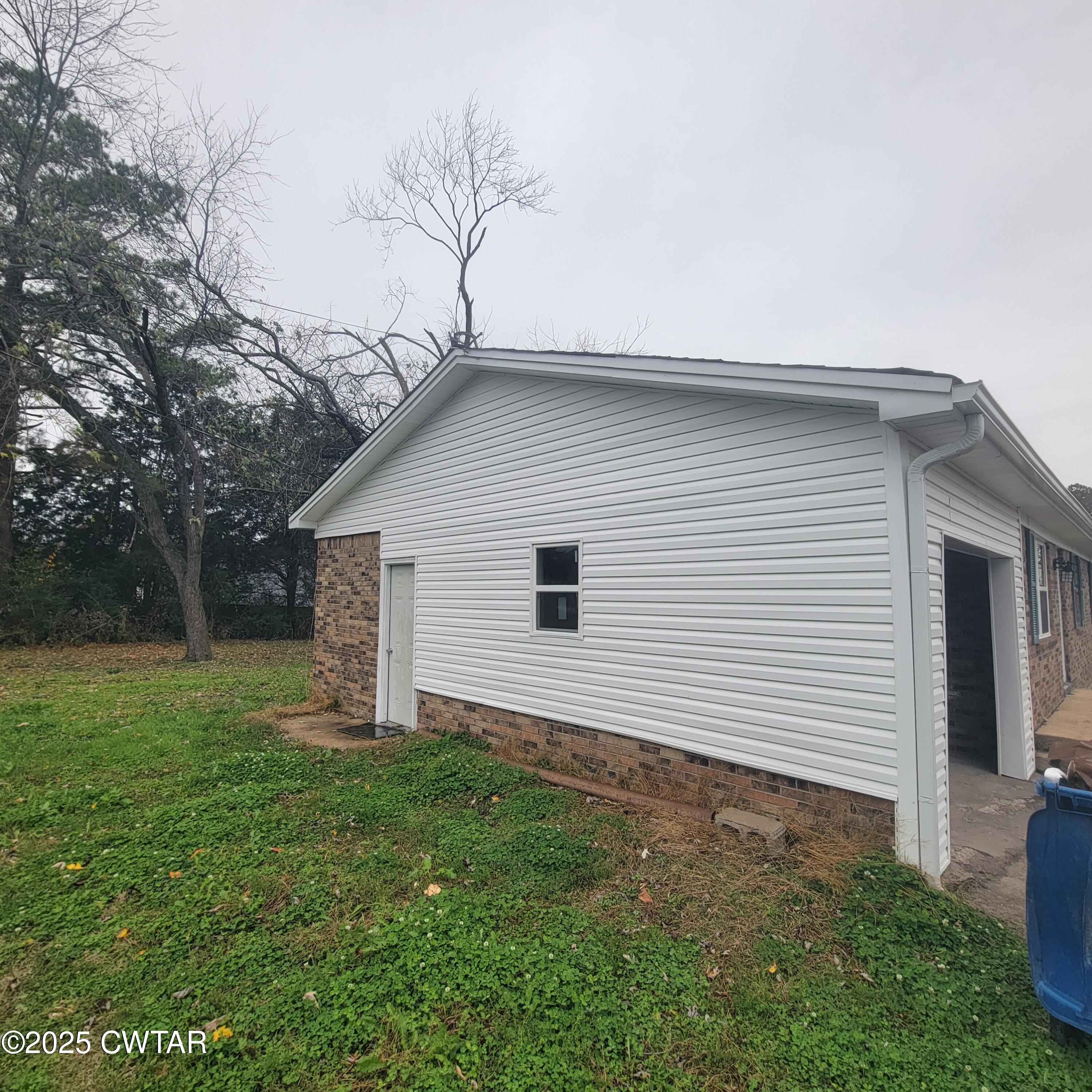201 Cross Street Rutherford, TN 38369 - Photo 13 of 14 a house with a backyard