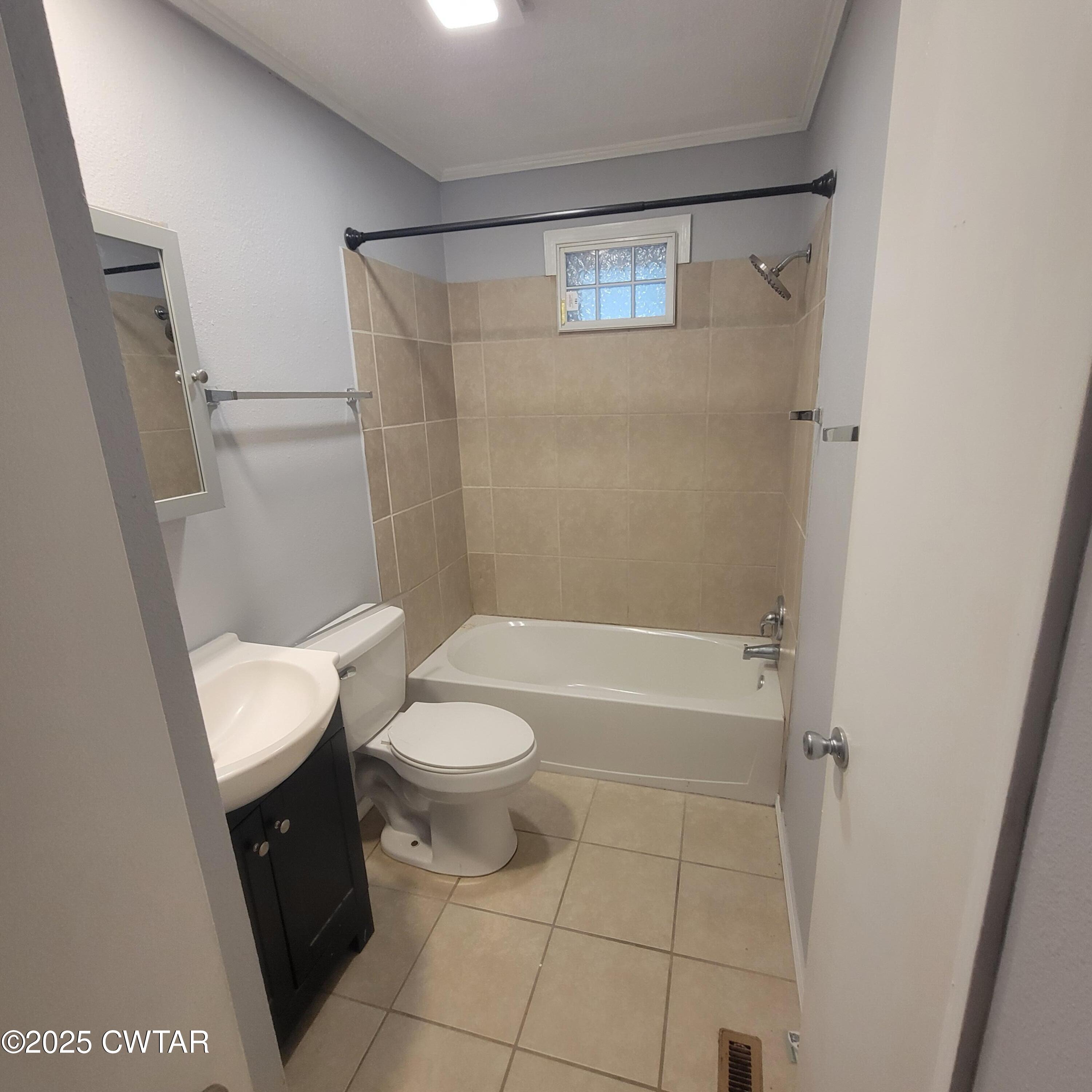 201 Cross Street Rutherford, TN 38369 - Photo 4 of 14 a bathroom with a toilet a sink and bathtub