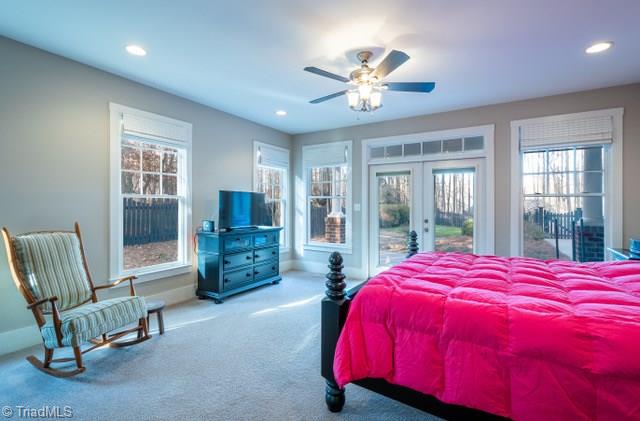 7381 Bullard Road Clemmons, NC 27012 - Photo 14 of 36 Spacious primary bedroom with double doors to patio and pool area