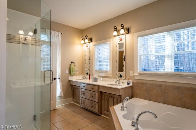 7381 Bullard Road Clemmons, NC 27012 - Photo 15 of 36 Primary bath features soaker tub & large walk-in shower and walk-in closet