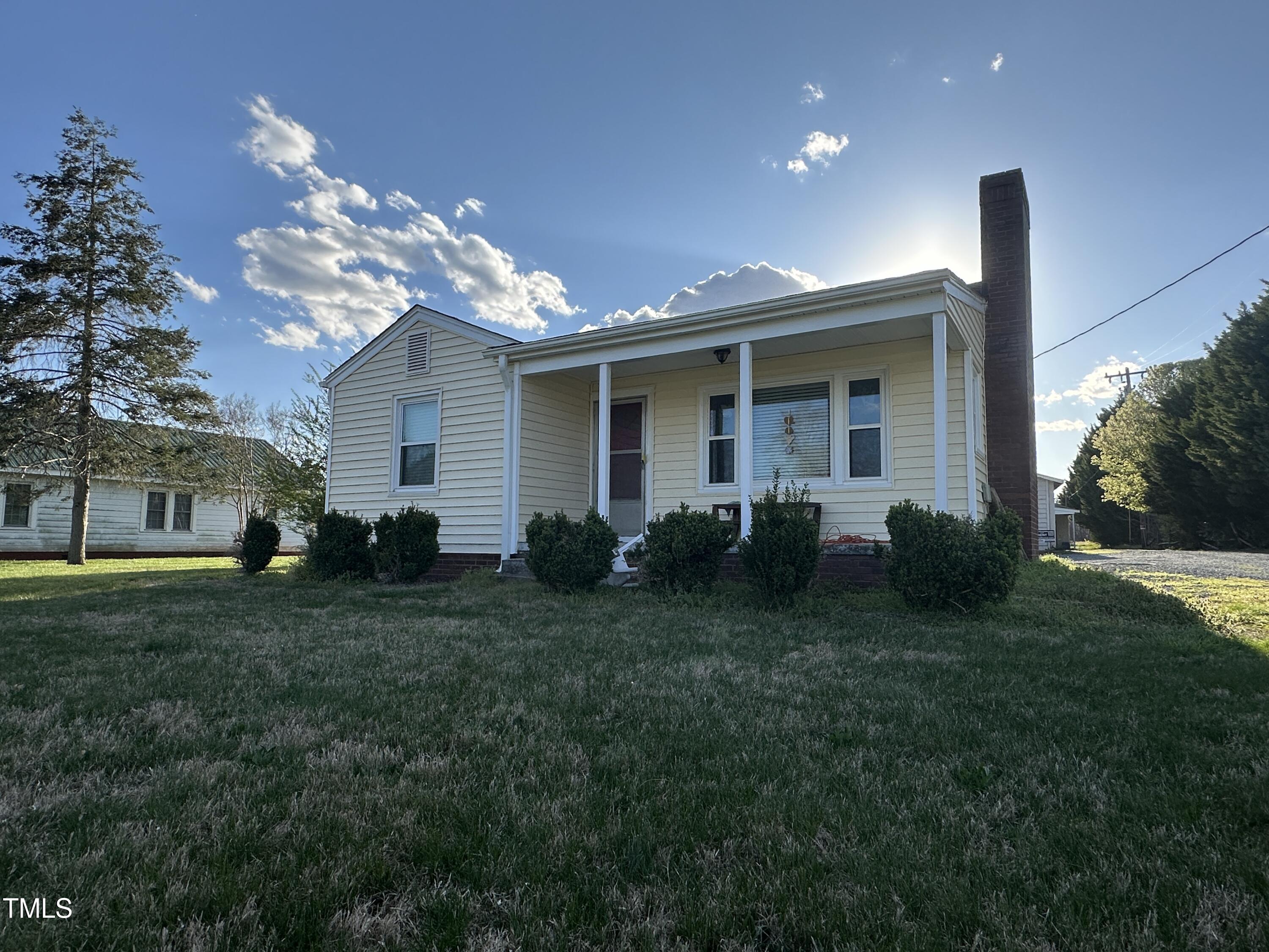 4459 Highway 62 Burlington, NC 27215 - Photo 1 of 27 a view of a house with a back yard