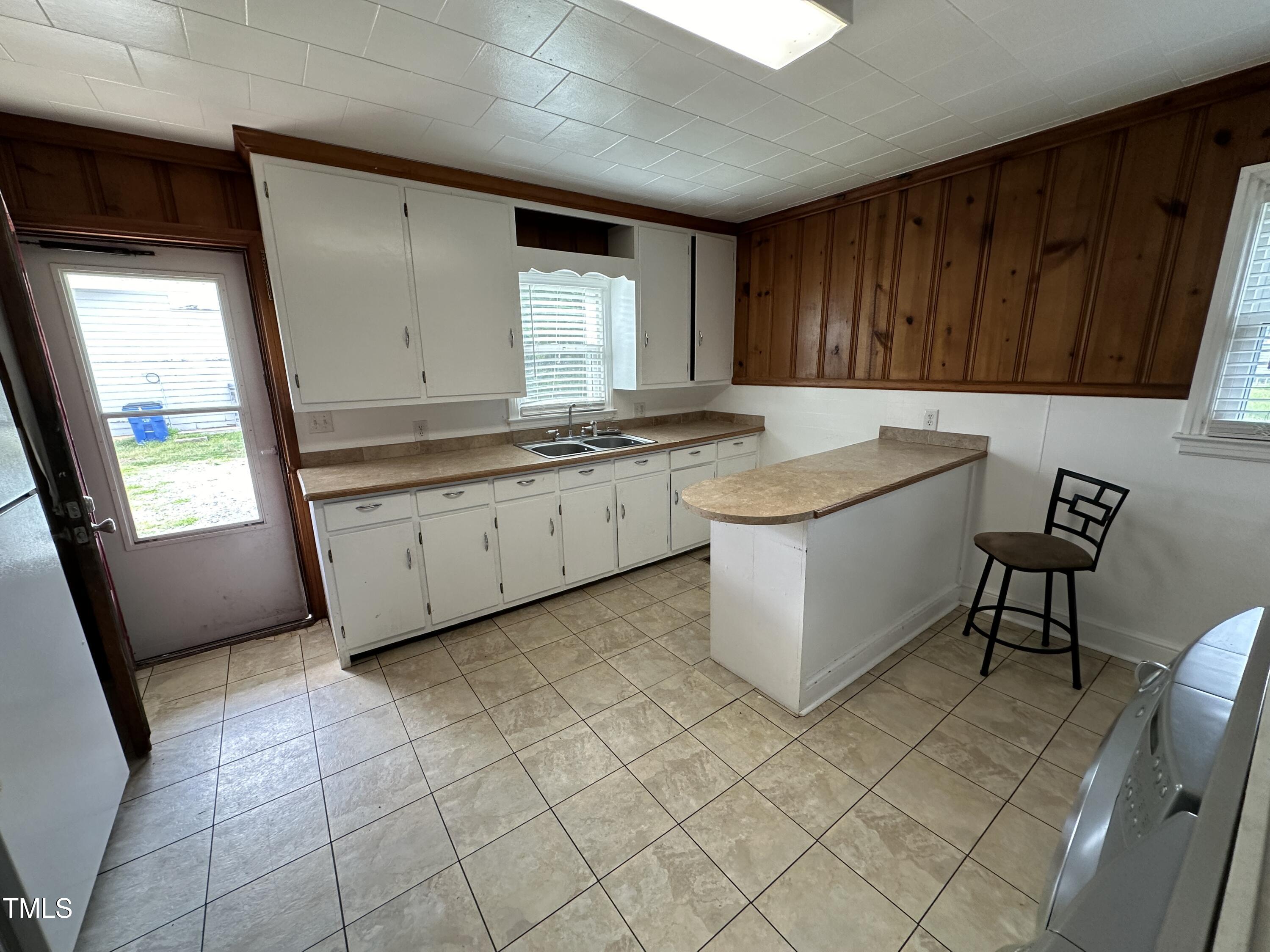 4459 Highway 62 Burlington, NC 27215 - Photo 11 of 27 a kitchen with a sink and cabinets