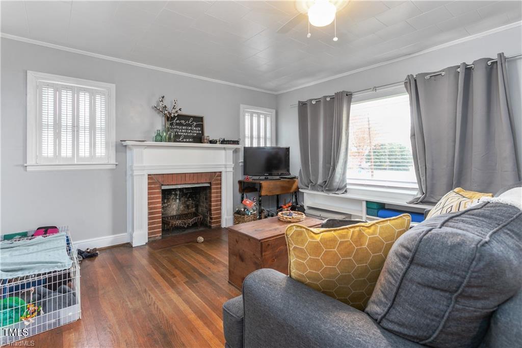 4459 Highway 62 Burlington, NC 27215 - Photo 2 of 27 a living room with furniture fireplace and window