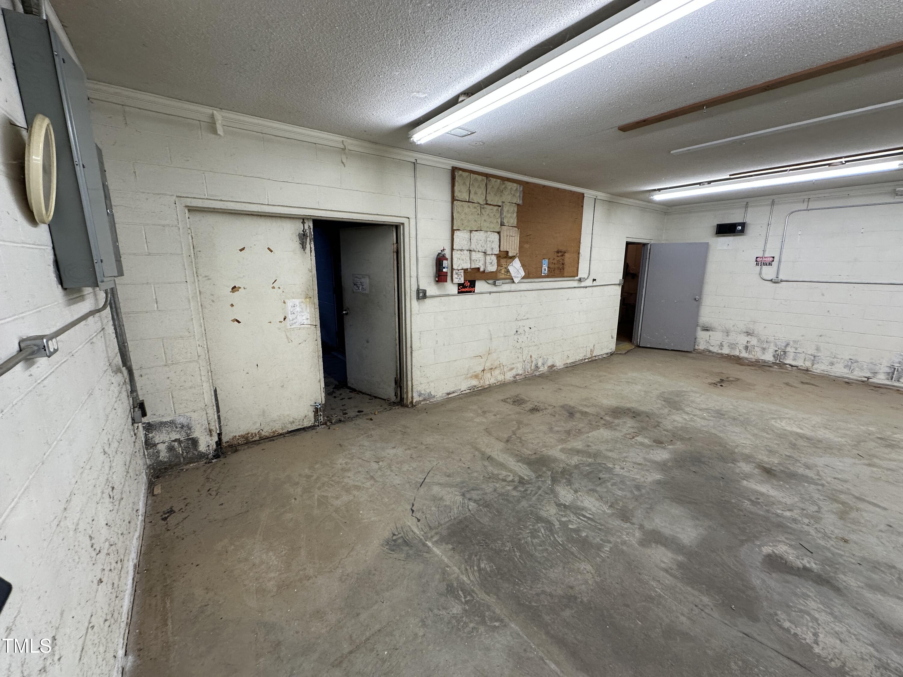 4459 Highway 62 Burlington, NC 27215 - Photo 24 of 27 a view of a big room with closet and cabinet