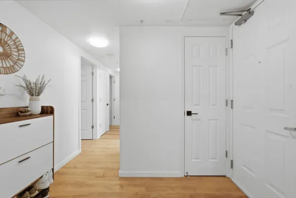 a view of a storage & utility room with a sink