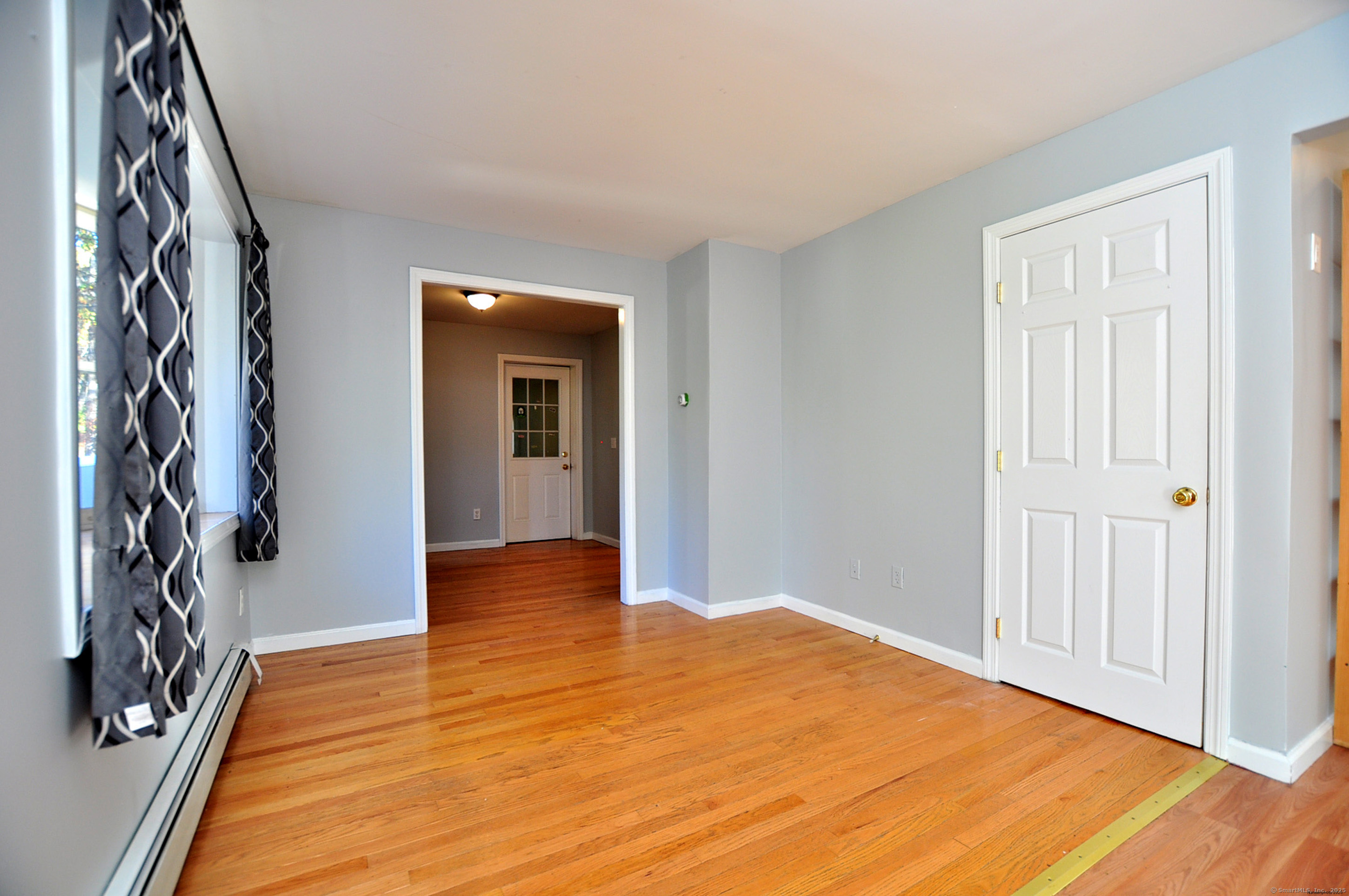 15 Clark Hill Road Prospect, CT 06712 - Photo 11 of 35 a view of an empty room with wooden floor