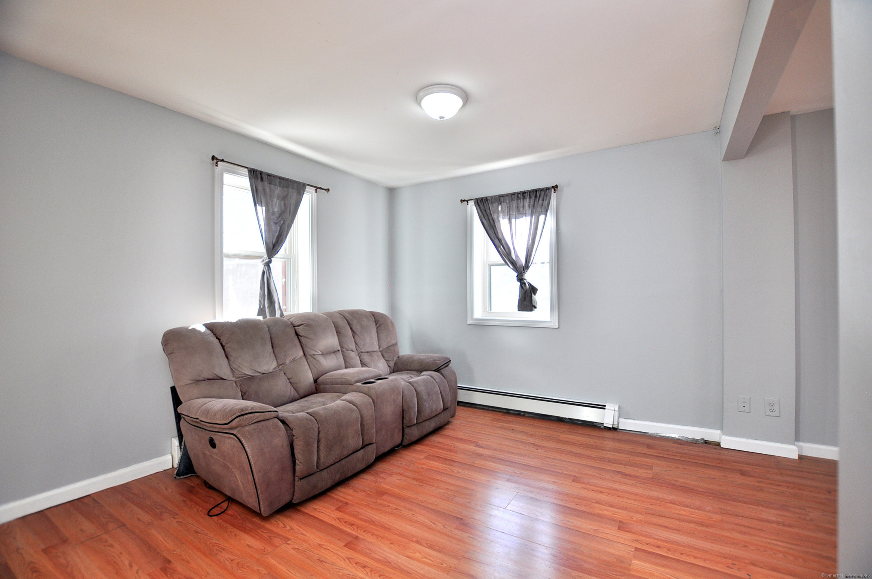 15 Clark Hill Road Prospect, CT 06712 - Photo 15 of 35 a living room with furniture and a window