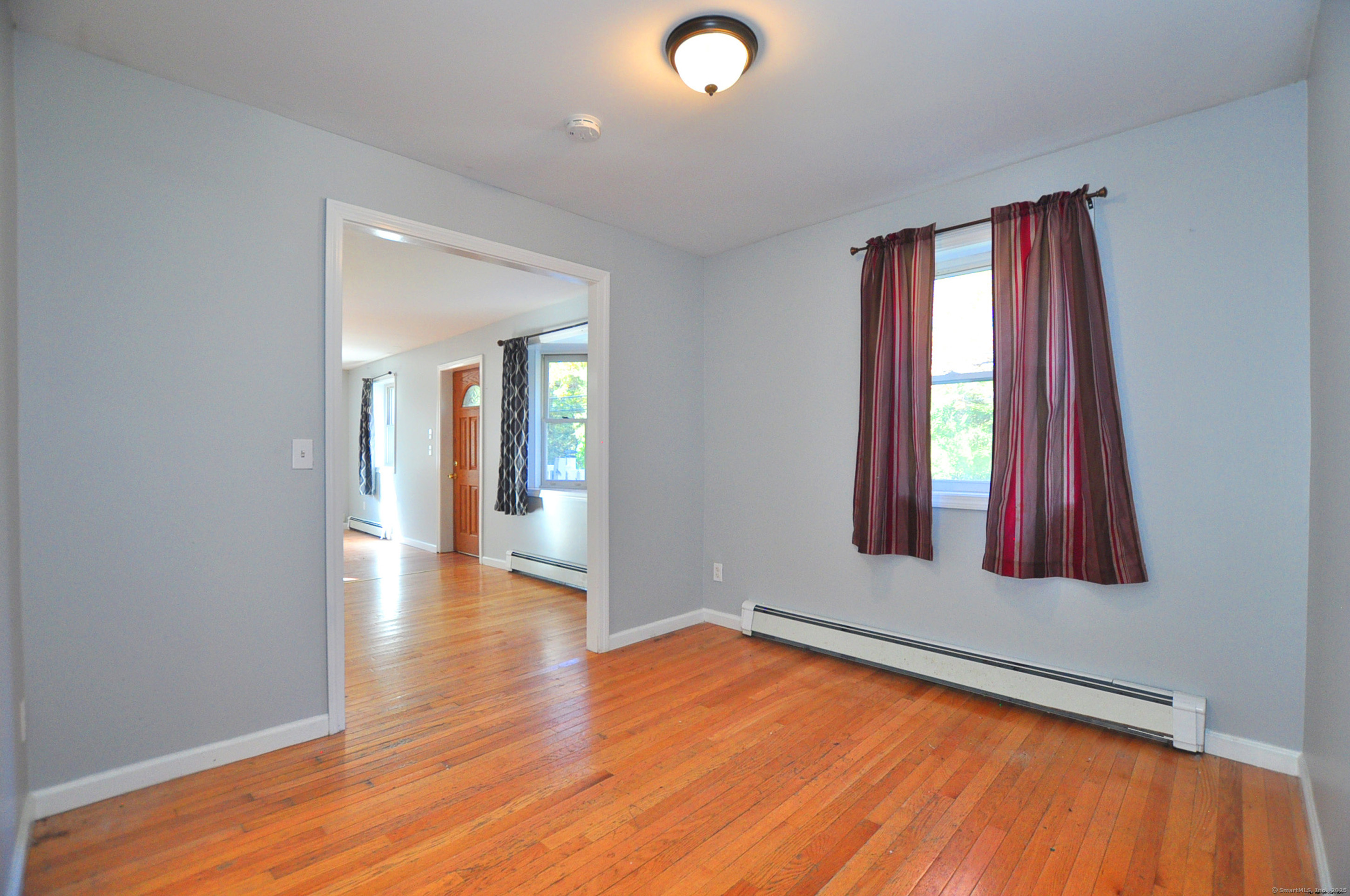 15 Clark Hill Road Prospect, CT 06712 - Photo 16 of 35 wooden floor in an empty room with a window