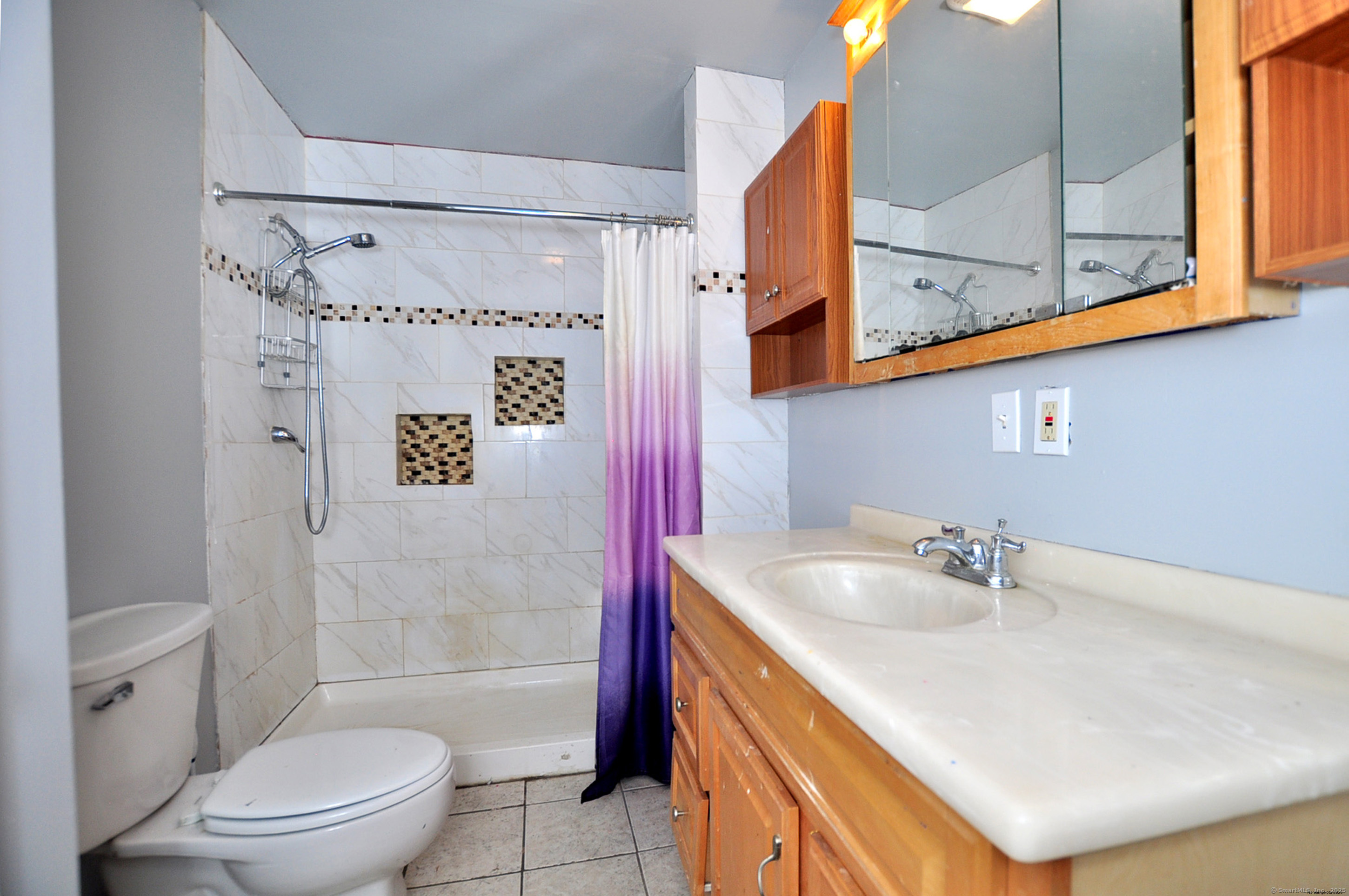 15 Clark Hill Road Prospect, CT 06712 - Photo 22 of 35 a bathroom with a sink a toilet and shower