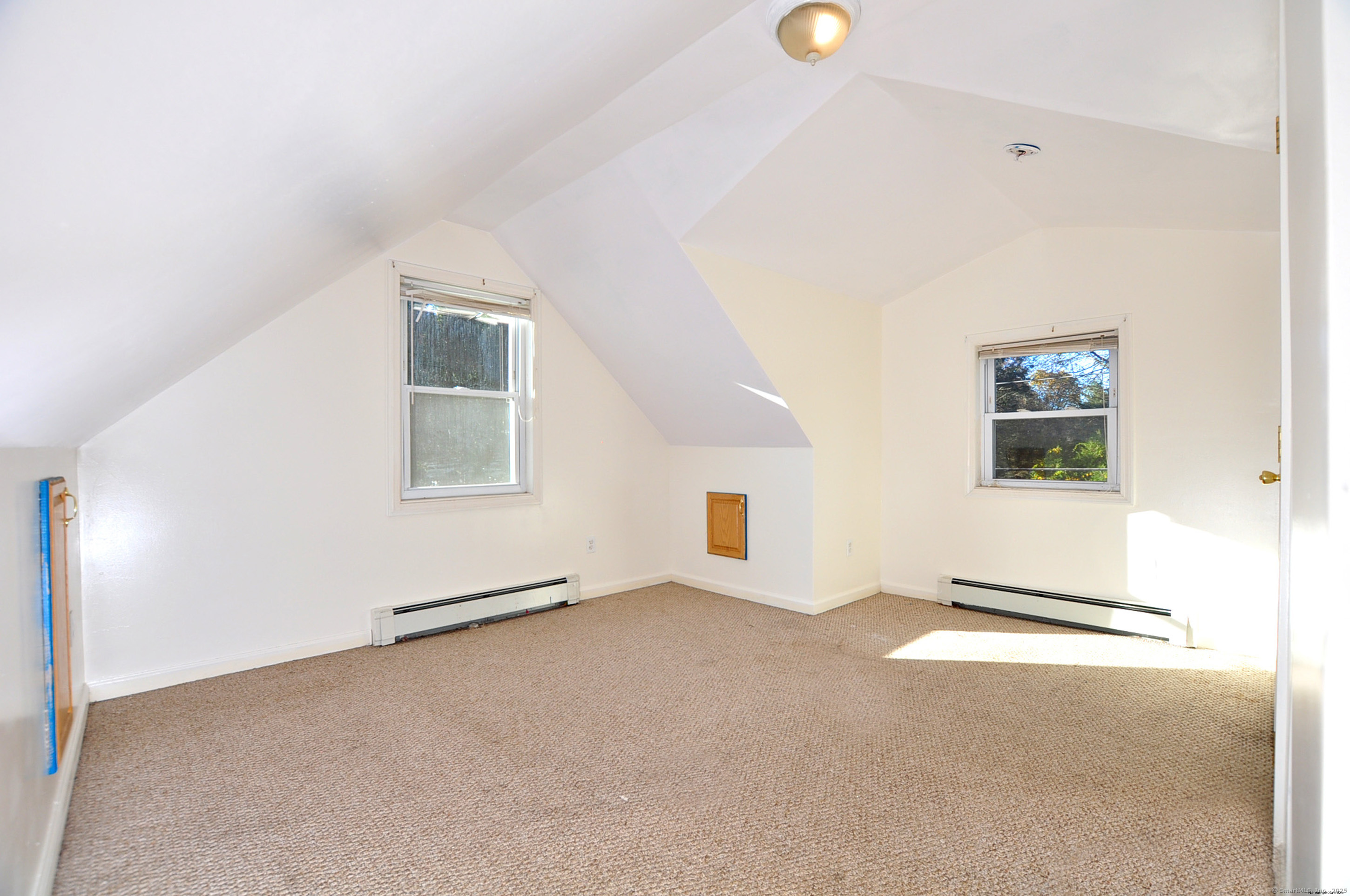 15 Clark Hill Road Prospect, CT 06712 - Photo 25 of 35 an empty room with windows