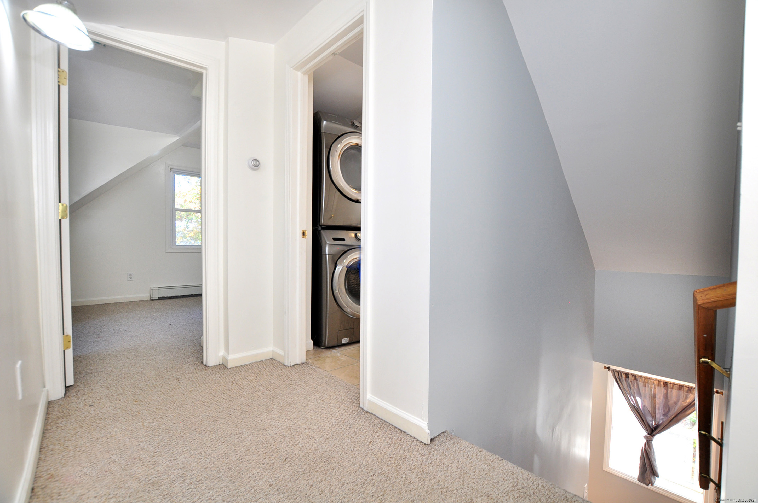 15 Clark Hill Road Prospect, CT 06712 - Photo 26 of 35 a view of a hallway with wooden floor and entryway