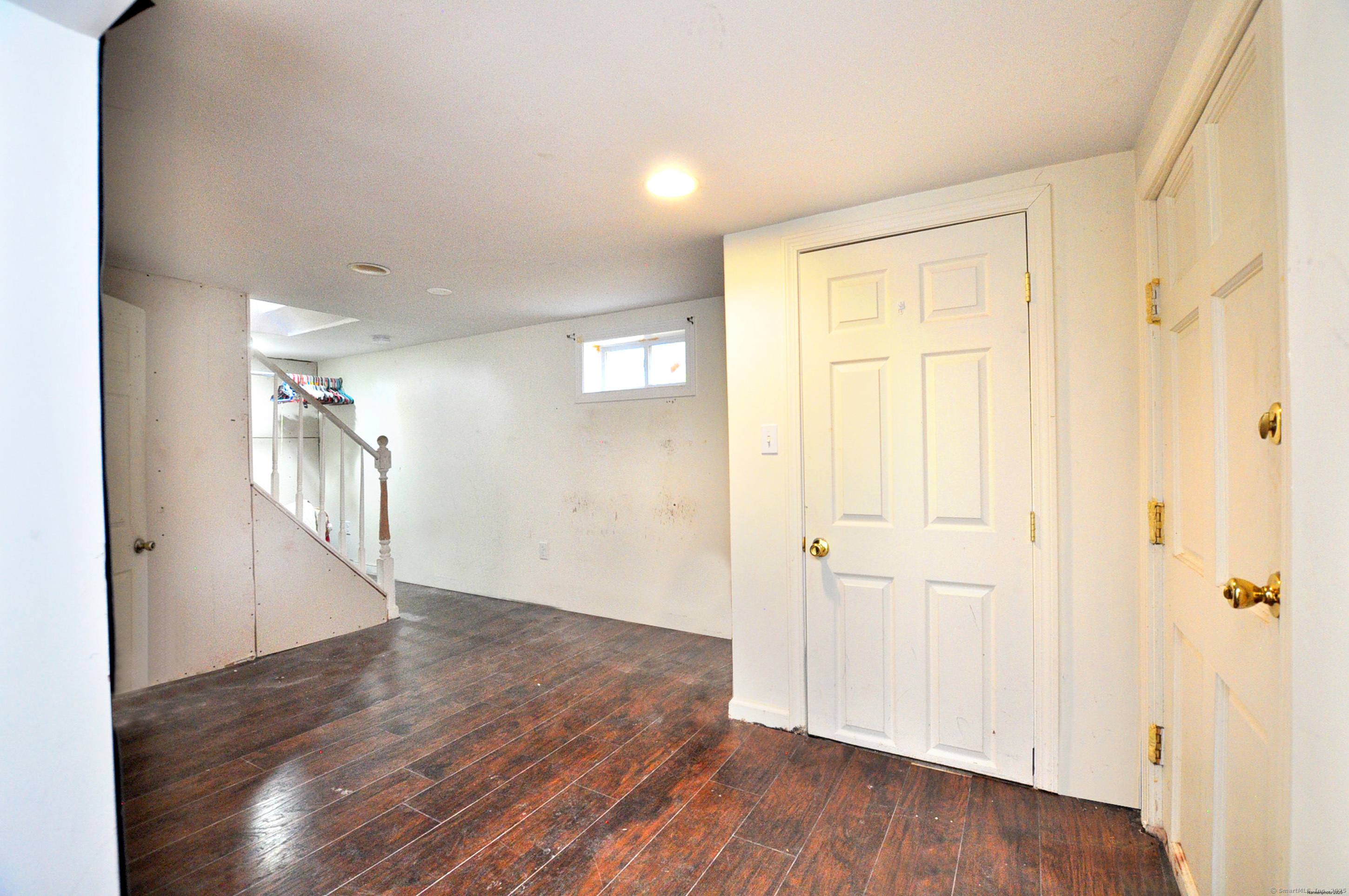 15 Clark Hill Road Prospect, CT 06712 - Photo 32 of 35 a view of an empty room with wooden floor