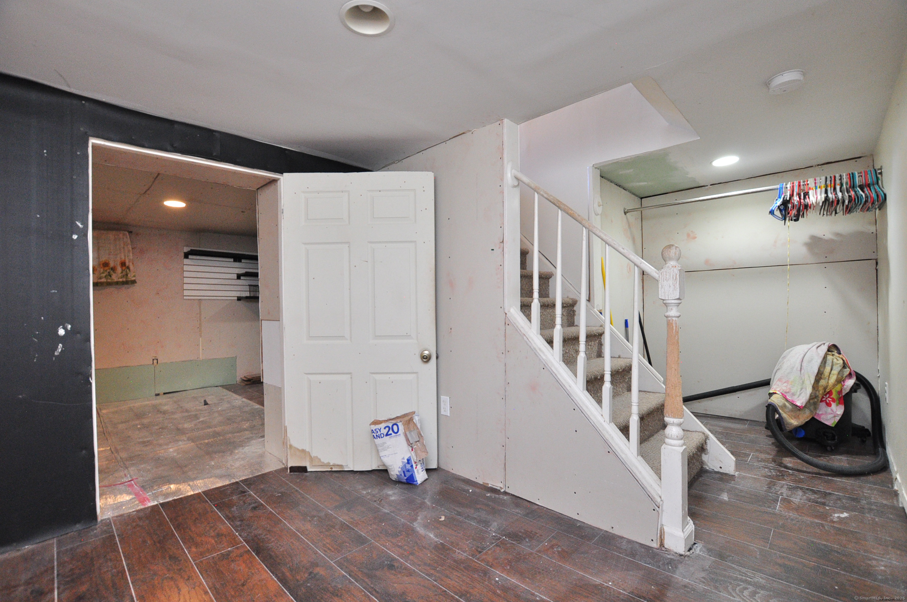 15 Clark Hill Road Prospect, CT 06712 - Photo 34 of 35 a view of a hallway with wooden floor and windows