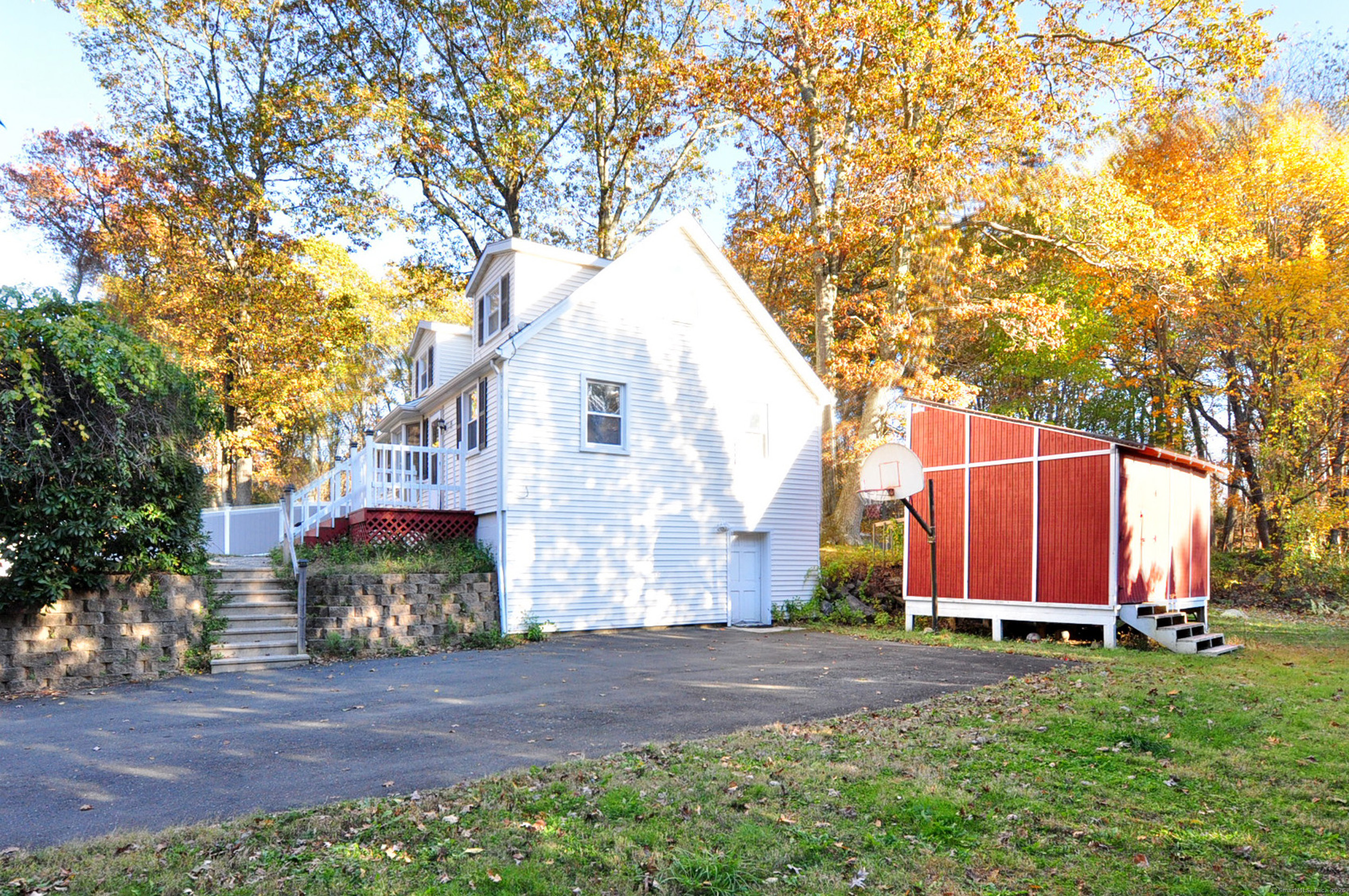 15 Clark Hill Road Prospect, CT 06712 - Photo 4 of 35 a view of a house with backyard and trees