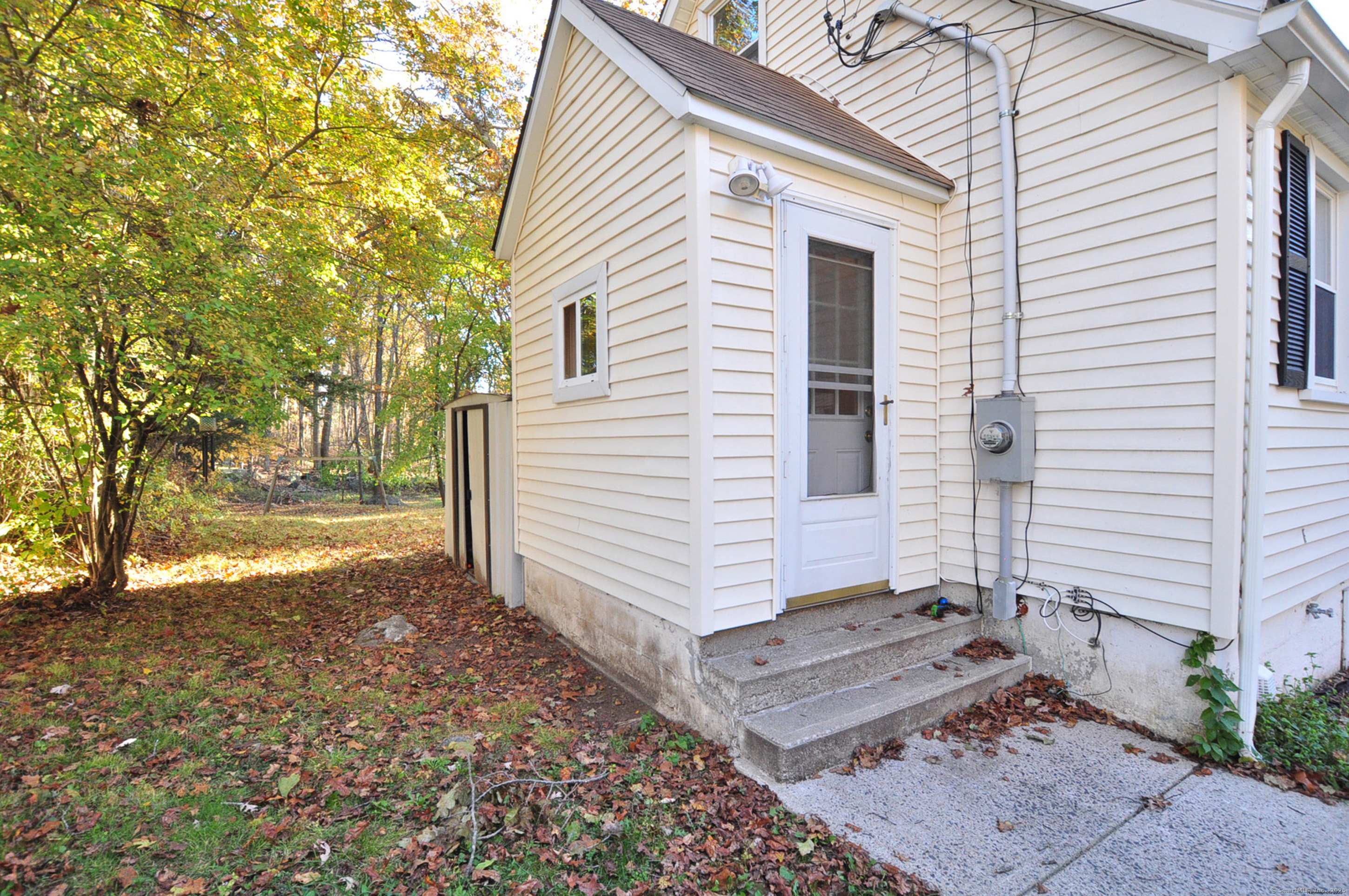 15 Clark Hill Road Prospect, CT 06712 - Photo 5 of 35 a view of a house with backyard and trees