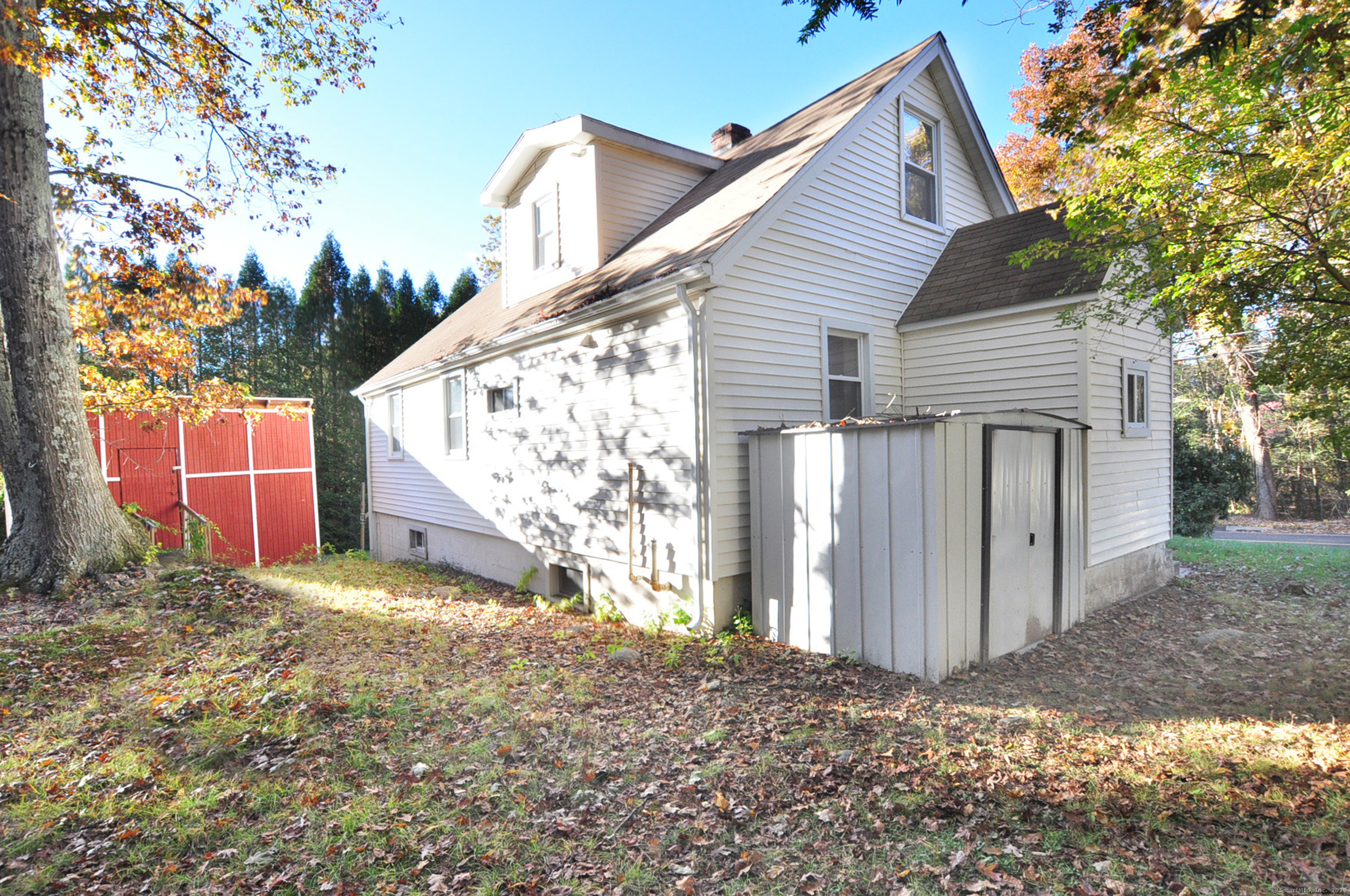 15 Clark Hill Road Prospect, CT 06712 - Photo 6 of 35 a view of a house with a yard and garage