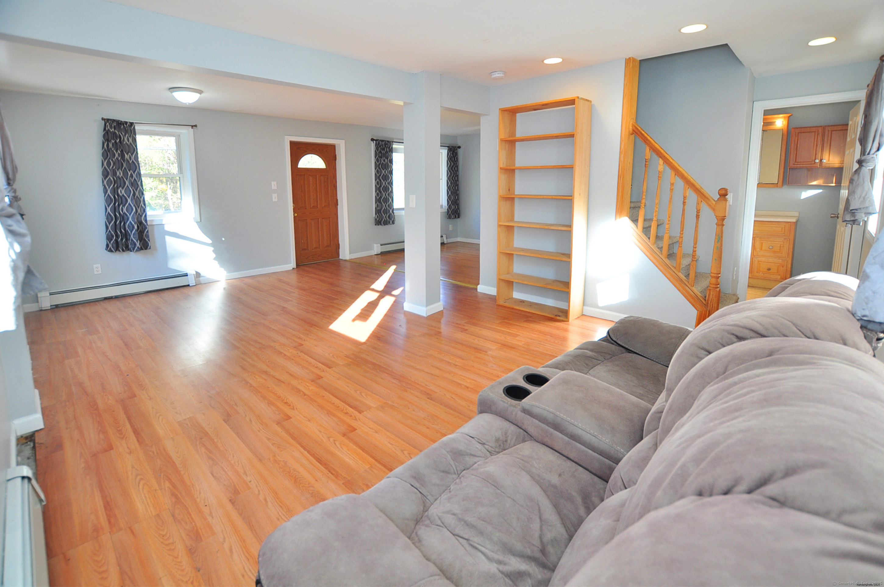15 Clark Hill Road Prospect, CT 06712 - Photo 9 of 35 a living room with furniture and wooden floor